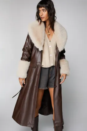 Faux leather trench coat with faux fur trim