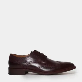 Handmade stitched lace-up derby shoe.