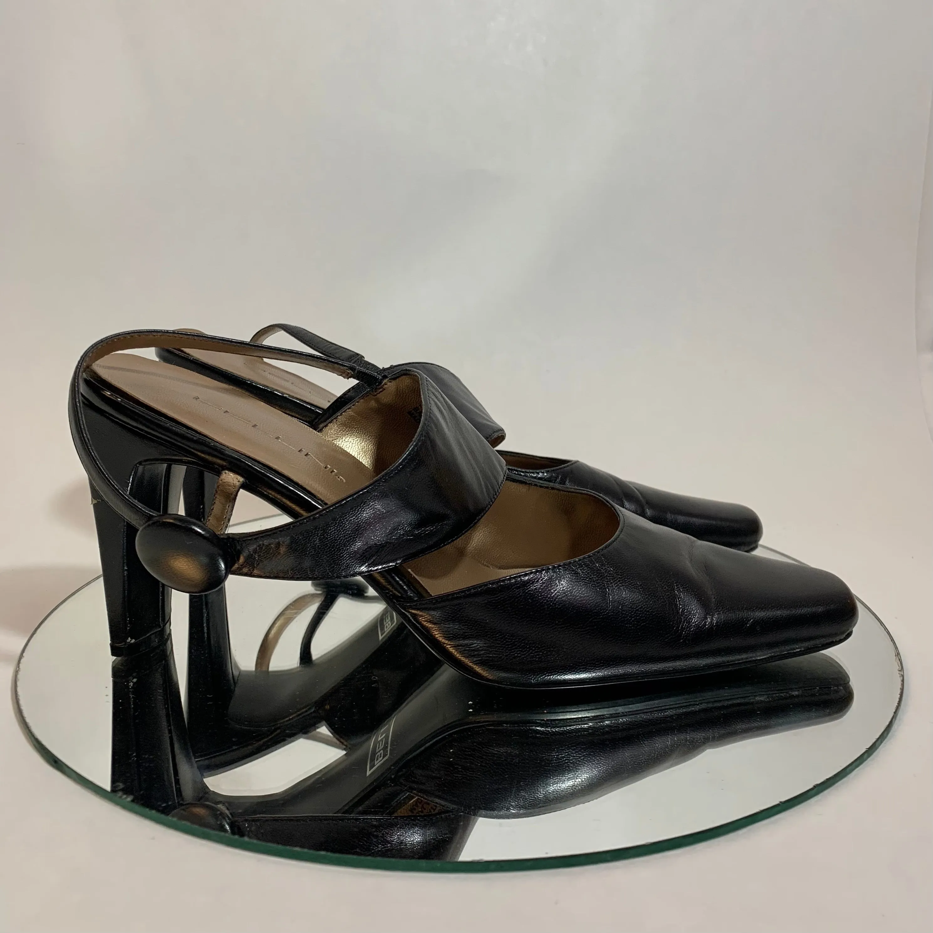 Heels with Off-Centered Strap Buttons