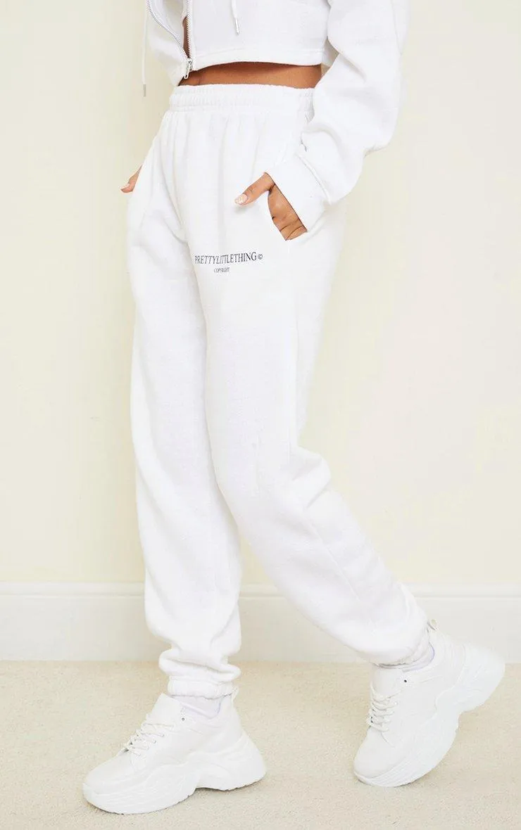 White Slogan Copyright Joggers