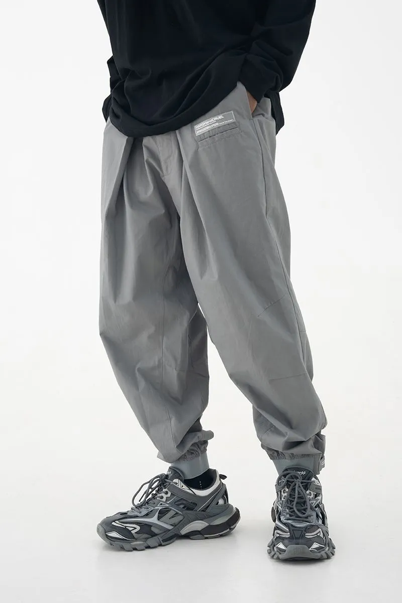 Pleated Logo Trousers