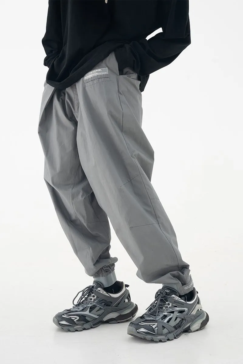 Pleated Logo Trousers